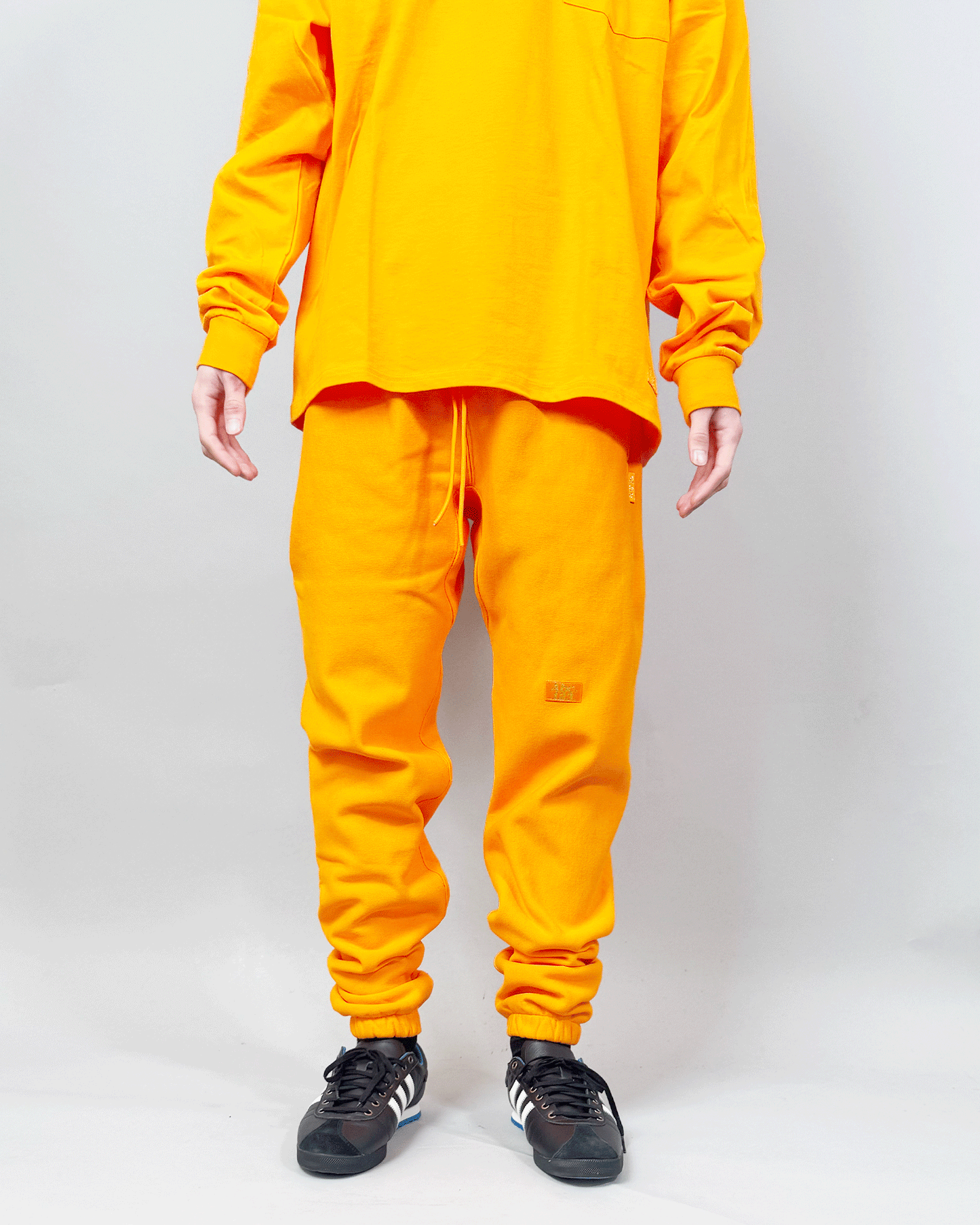 アドバイザリーボードクリスタルズ/Sweatpants/スウェットパンツ/ORANGE