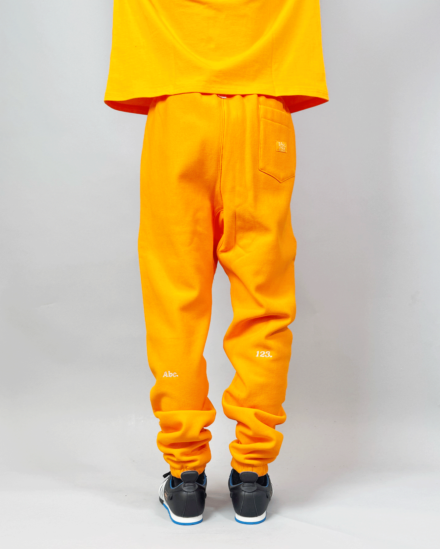 アドバイザリーボードクリスタルズ/Sweatpants/スウェットパンツ/ORANGE